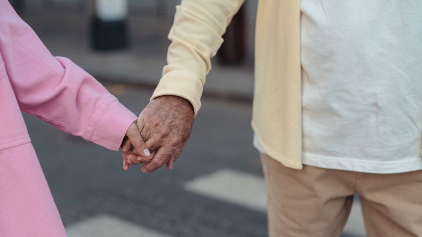 A couple holding hands