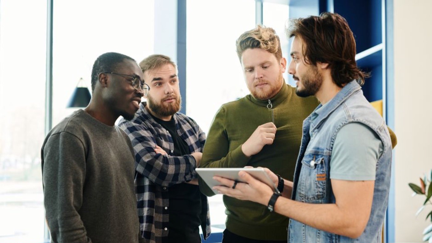 A group of men in conversation